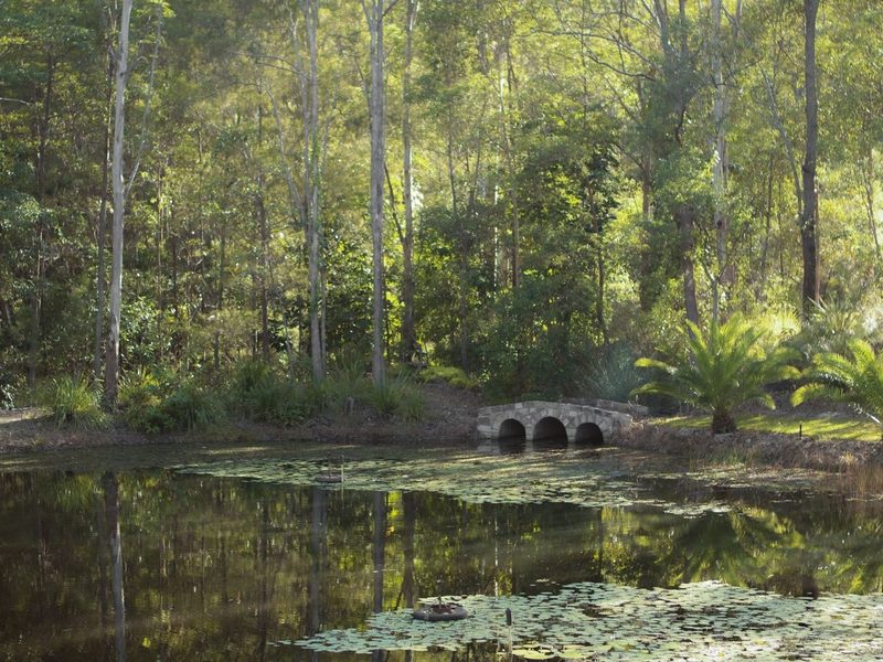 The lake and stone bridge at the Homestead